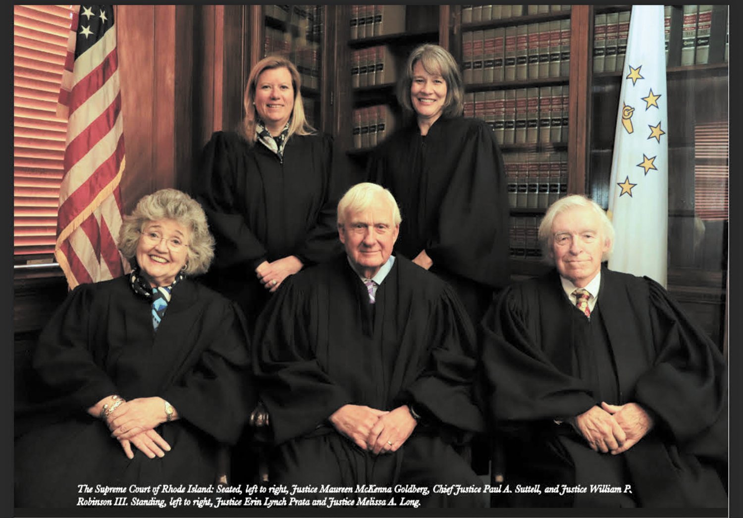 THE FULL BENCH: Rhode Island Supreme Court justices from left seated are: Maureen McKenna Goldberg, Chief Justice Paul A. Suttell and William P. Robinson III and standing Erin Lynch Prata and Melissa A. Long.
